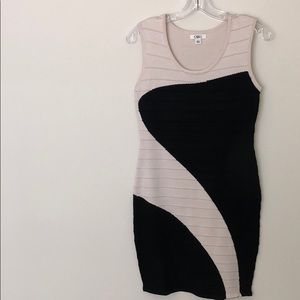 Fitted black and cream dress